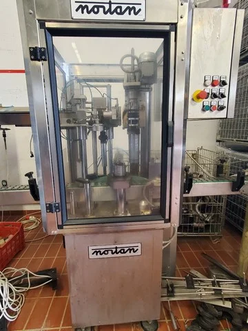 Used Nortan capsuling machine