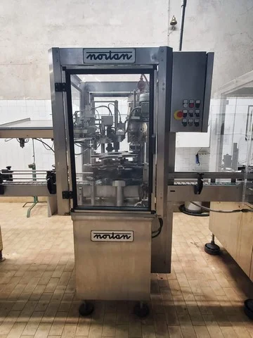 Used Nortan capsuling machine