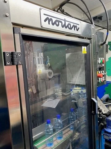 Used Nortan capsuling machine — 2