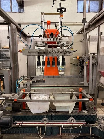 Used Keber case erector and case packer
