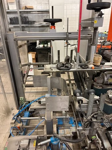 Used Keber case erector and case packer — 2