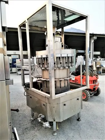 Used filler Ocim vacuum filling 3.000 bph — 2