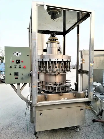 Used filler Ocim vacuum filling 3.000 bph — 3