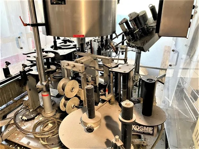 Used labeller Kosme adhesive line — 3