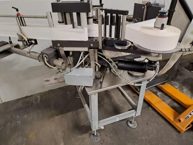 Used labeller Krones Bonamatic adhesive — 7