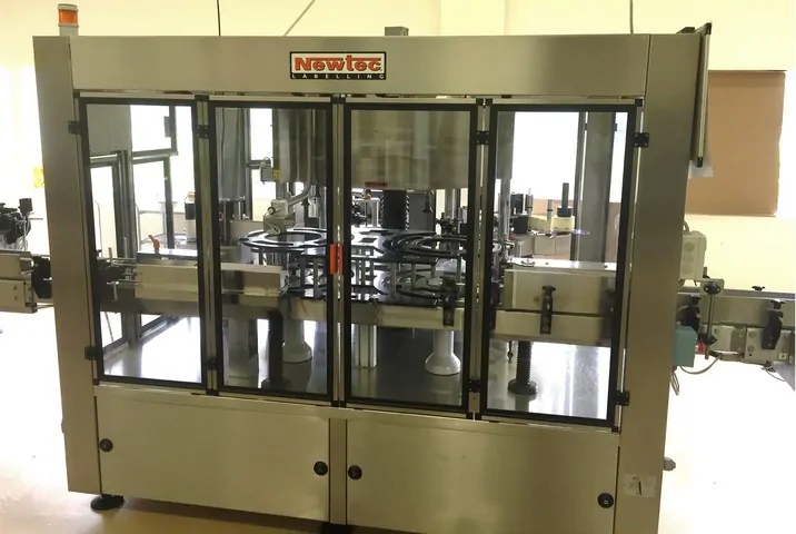 Used labeller Newtec adhesive 3.500 bph — 2