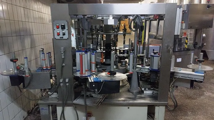 Used labeller P.E. adhesive — 2