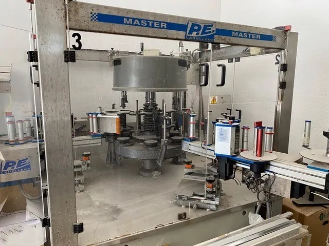 Used Labeller P.E. Master M 6T Adhesive — 2