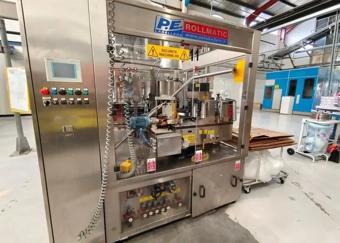 Used labeller P.E. Rollmatic 12.000 bph — 4