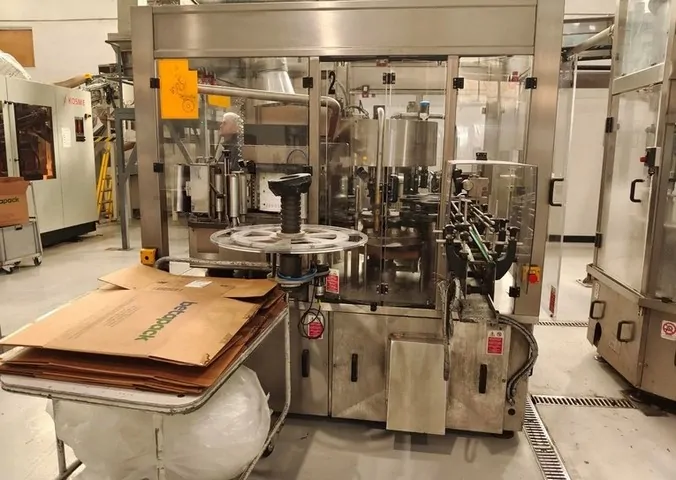 Used labeller P.E. Rollmatic 12.000 bph — 5